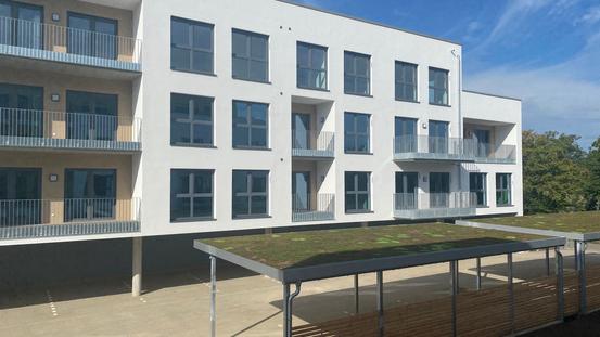 Blick auf die Ostseite des Wohnhofes 4 Eversheide nach Fertigstellung im September 2023.