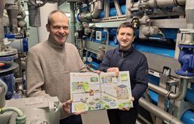 Der Osnabrücker Illustrator Markus Humbach (links) hat ein neues Kinderbuch des Ravensburger Verlags gestaltet. Hilfe bekam er von Alex Jost und seinem Team aus der SWO Netz.